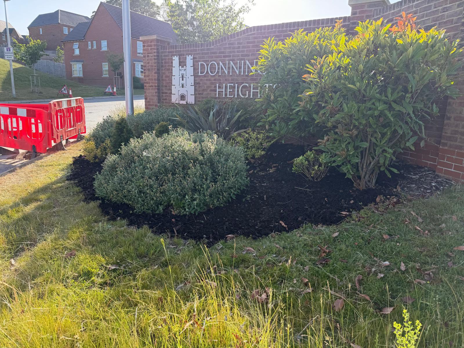 Maintained entrance planting on a managed development