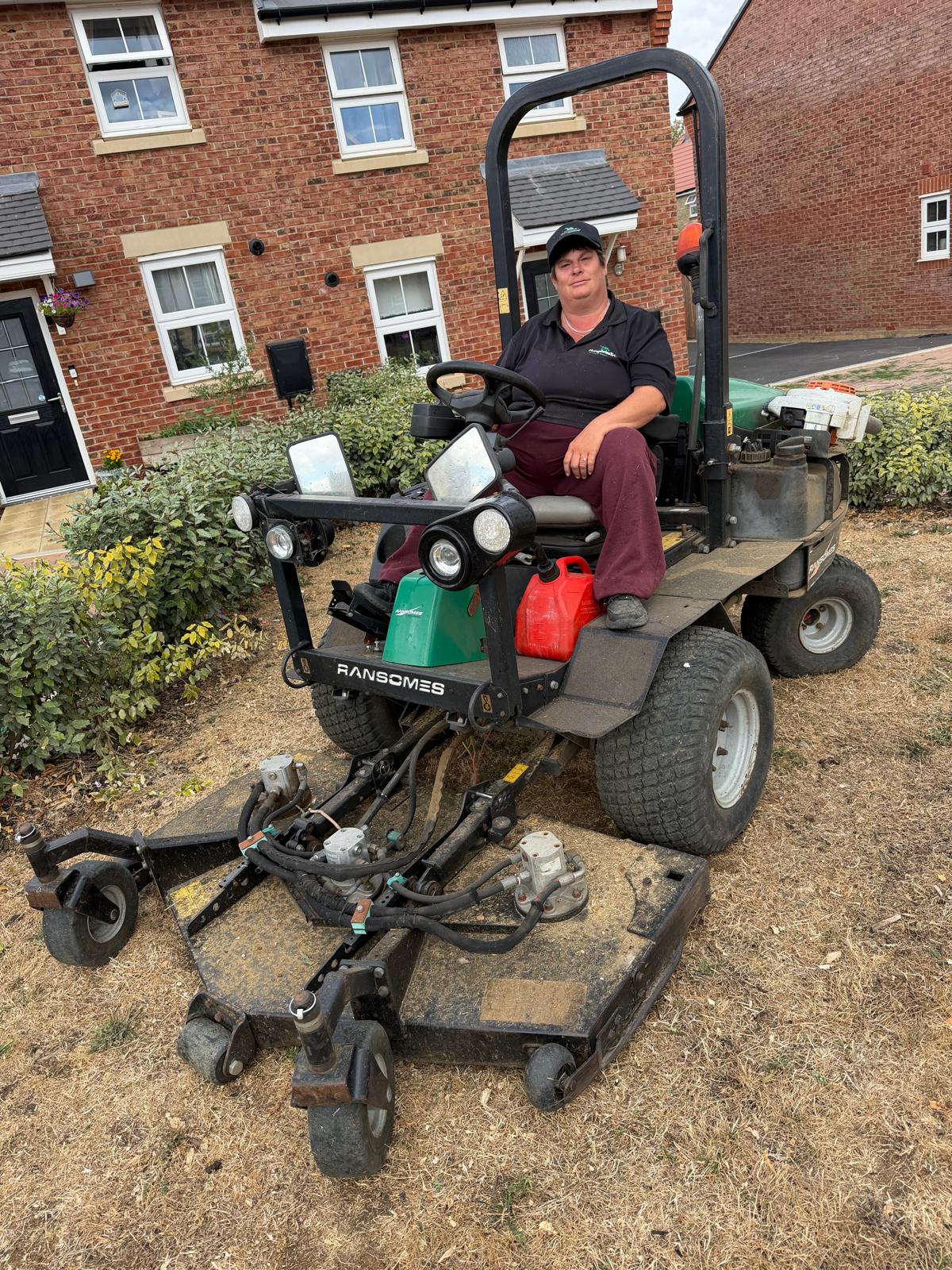 HumphriesTrio operator mowing communal grounds on a residential development